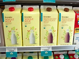 Close up of GreenWise milk and chocolate milk cartons