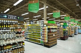 Wide shot of grocery aisles 