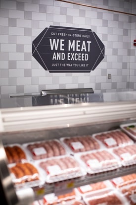 Publix meat department new decor sign saying "We meat and exceed"