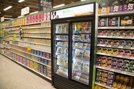 Publix pet food aisle with refrigerator case