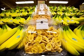 Display with fresh bananas and dried sliced bananas