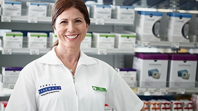 smiling female Pharmacy associate