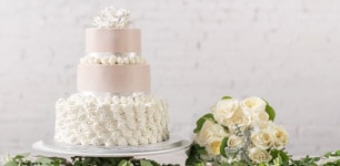 Wedding cake and floral bouquet