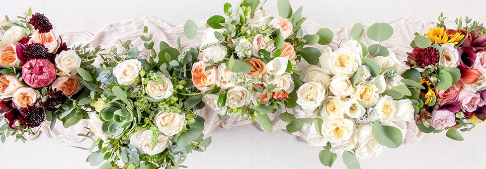 Velvet Dream, Green Harmony, Forever Coral, Pearl Perfect, and Amber Romance floral bouquets
